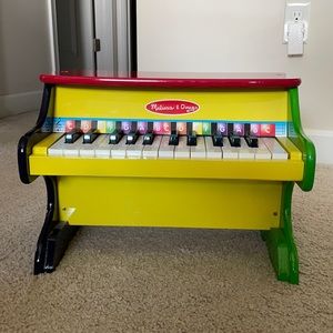 Melissa & Doug learn to play piano